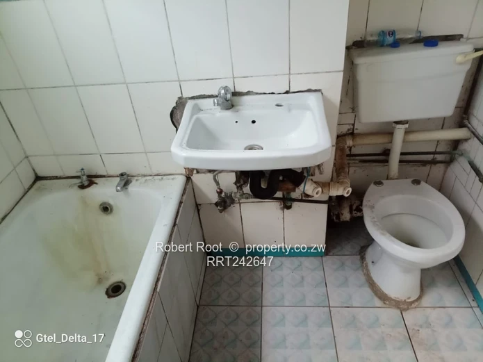 1-Bed Harare CBD Flat — Tiled Floors, Fitted Kitchen
