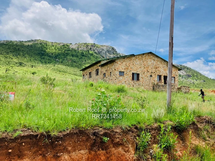 Stone Lodge for Sale in Nyanga — 1,800 m² with Mountain Views