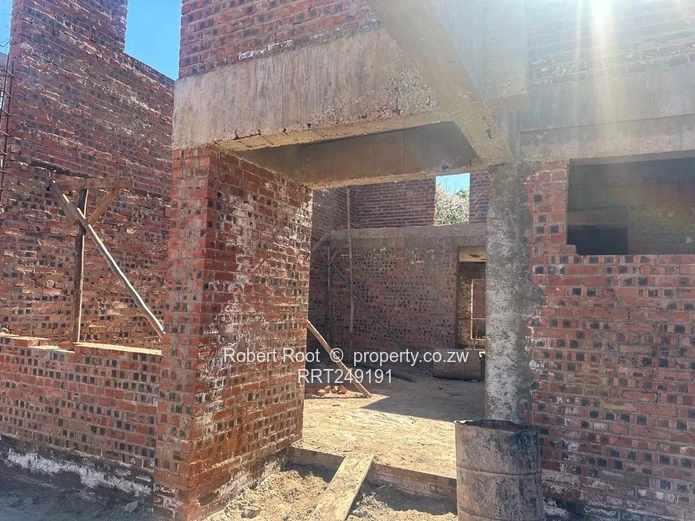 Luxury Awaits in Borrowdale: Finish Your Dream Home Today!
