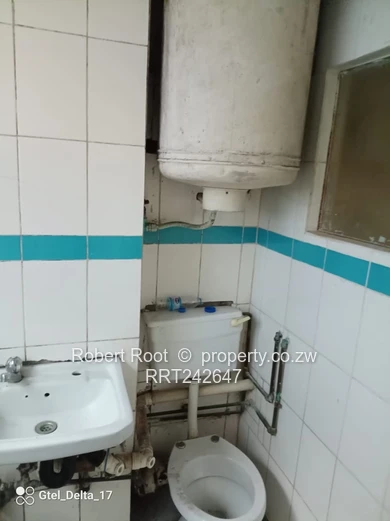 1-Bed Harare CBD Flat — Tiled Floors, Fitted Kitchen