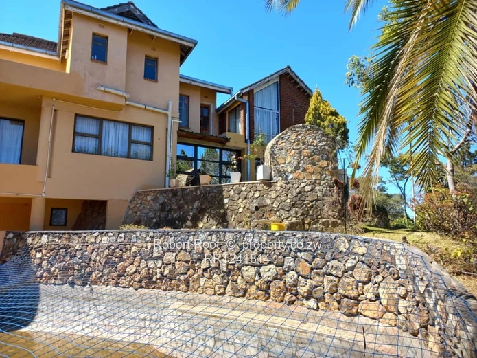 Multi-level 5-Bed Glen Lorne Home with Pool & Stone Terraces