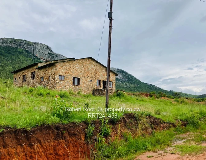 Stone Lodge for Sale in Nyanga — 1,800 m² with Mountain Views
